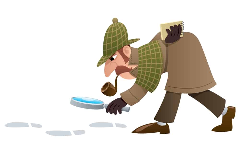 detective sleuth looking at footprints on the floor with a magnifying glass